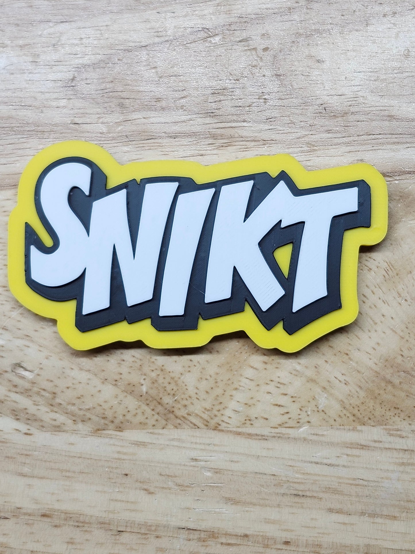 SNIKT - WHAMblem